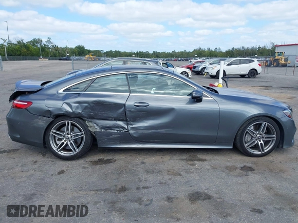 2018 Mercedes-Benz E 400 with VIN WDD1J6FB9JF015064, listed as a IAAI auction lot 42165914 with 95,290 mi miles and . Bid and sale history available at DreamBid. Image 14.