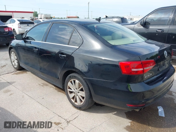 2015 Volkswagen Jetta SE with VIN 3VWD07AJ7FM306911, listed as a IAAI auction lot 42173985 with 143,111 mi miles and . Bid and sale history available at DreamBid. Image 3.