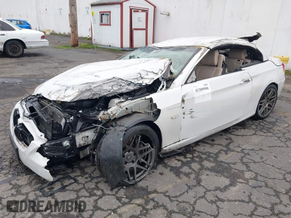 2011 BMW 3 Series 335i with VIN WBADX7C50BE580088, listed as a IAAI auction lot 41309990 with Not Provided miles and . Bid and sale history available at carsss.com. Image 2.