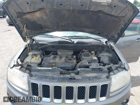 2011 Jeep Compass Latitude with VIN 1J4NT1FB4BD246549, listed as a IAAI auction lot 42156761 with 232,739 mi miles. Bid and sale history available at carsss.com. Image 10.