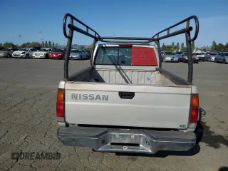 1996 Nissan Frontier XE z VIN 1N6SD11SXTC371962, wystawiony jako Copart lot #52947535 z przebiegiem 256 352 mil mil oraz Czysty tytuł • Clean title. Historia ofert i sprzedaży dostępna na DreamBid. Obrazek 6.