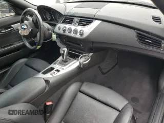 2015 BMW Z4 sDrive35is with VIN WBALM1C59FE634589, listed as a Copart auction lot 67096594 with 0 mi miles and Salvage Title. Bid and sale history available at carsss.com. Image 8.