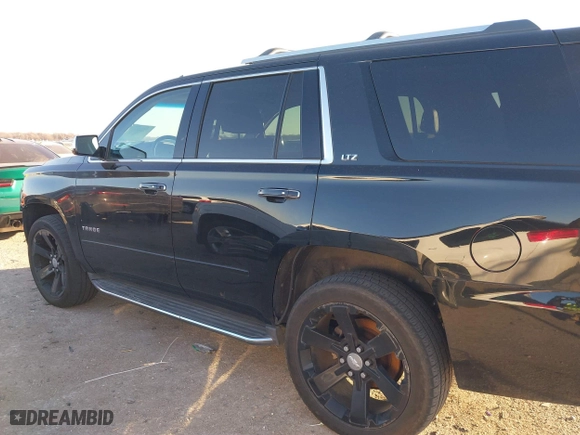 2016 Chevrolet Tahoe LTZ with VIN 1GNSKCKC1GR381785, listed as a IAAI auction lot 41376945 with 120,279 mi miles. Bid and sale history available at carsss.com. Image 14.