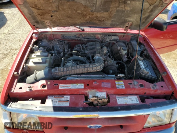 1997 Ford Ranger XLT with VIN 1FTCR11X1VTA20882, listed as a Copart auction lot 70052614 with 211,824 mi miles and Salvage title. Bid and sale history available at DreamBid. Image 12.