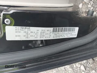 2019 Dodge Grand Caravan SXT with VIN 2C4RDGCG6KR749505, listed as a IAAI auction lot 42087083 with 167,551 mi miles and . Bid and sale history available at DreamBid. Image 9.