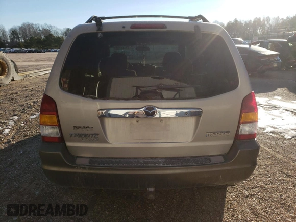 2002 Mazda Tribute LX with VIN 4F2CU08172KM40111, listed as a Copart auction lot 47141754 with 131,324 mi miles and Non Repairable. Bid and sale history available at carsss.com. Image 6.