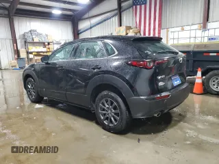 2021 Mazda CX-30 S with VIN 3MVDMAAL1MM259313, listed as a Copart auction lot 88684555 with 47,535 mi miles and Salvage title. Bid and sale history available at DreamBid. Image 2.