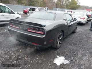 2015 Dodge Challenger R/T with VIN 2C3CDZAT9FH782760, listed as a IAAI auction lot 41531276 with 76,957 mi miles. Bid and sale history available at carsss.com. Image 4.