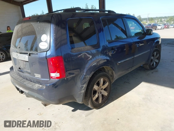 2013 Honda Pilot Touring with VIN 5FNYF4H95DB079782, listed as a IAAI auction lot 42737391 with 152,830 mi miles and . Bid and sale history available at DreamBid. Image 4.