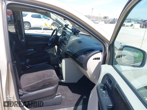 2013 Dodge Grand Caravan SE with VIN 2C4RDGBG9DR642162, listed as a IAAI auction lot 42113378 with 182,370 mi miles and . Bid and sale history available at DreamBid. Image 5.
