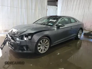 2018 Audi A5 Premium z VIN WAUNNAF51JA000565, wystawiony jako Copart lot #74886844 z przebiegiem 56 854 mil mil oraz Szkoda całkowita • Salvage title. Historia ofert i sprzedaży dostępna na DreamBid. Obrazek 1.