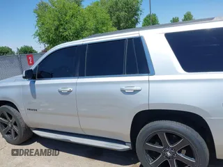 2015 Chevrolet Tahoe LT with VIN 1GNSCBKC9FR111001, listed as a IAAI auction lot 42440624 with 128,087 mi miles and . Bid and sale history available at DreamBid. Image 13.