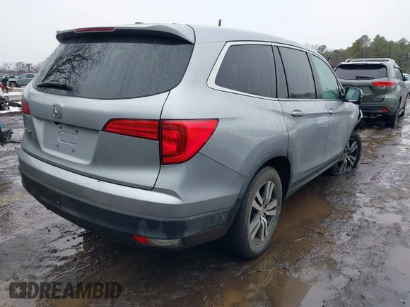2017 Honda Pilot EX-L with VIN 5FNYF6H51HB069068, listed as a IAAI auction lot 41567728 with 100,618 mi miles and . Bid and sale history available at DreamBid. Image 4.