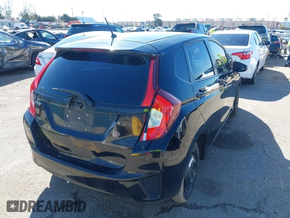 2015 Honda Fit LX with VIN 3HGGK5H56FM706547, listed as a IAAI auction lot 41745026 with 252,238 mi miles. Bid and sale history available at carsss.com. Image 4.