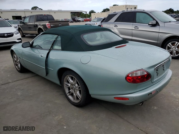 2002 Jaguar XK8 with VIN SAJDA42C52NA27475, listed as a Copart auction lot 74382624 with NaN miles and Salvage Title. Bid and sale history available at carsss.com. Image 2.