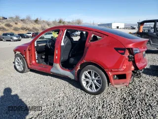2023 Tesla Model Y Long Range with VIN 7SAYGDEE7PA044888, listed as a Copart auction lot 48538335 with 25,621 mi miles and Salvage Title. Bid and sale history available at DreamBid. Image 2.
