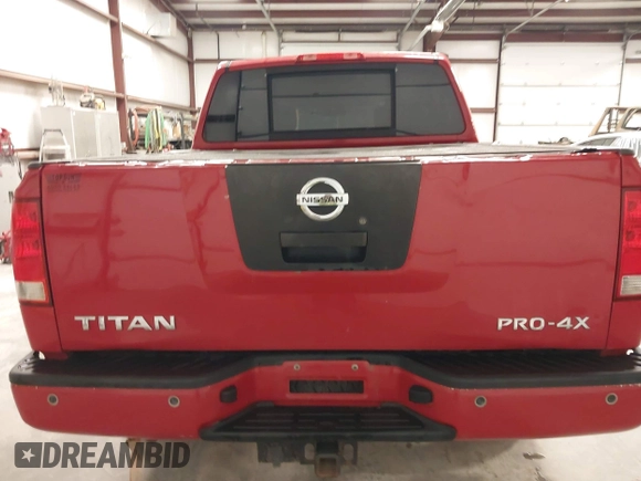 2012 Nissan Titan SV with VIN 1N6AA0EC7CN327973, listed as a IAAI auction lot 41841596 with 148,519 mi miles. Bid and sale history available at carsss.com. Image 16.