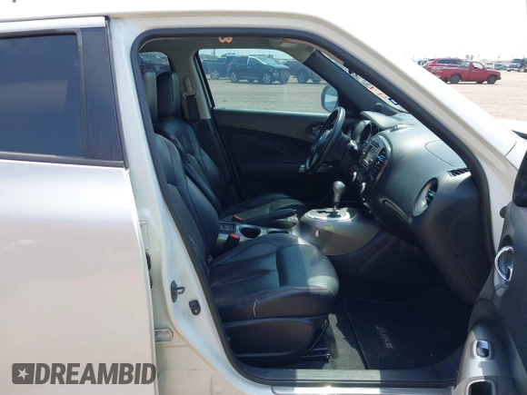 2013 Nissan Juke SV with VIN JN8AF5MR4DT225880, listed as a IAAI auction lot 41932207 with 212,193 mi miles. Bid and sale history available at carsss.com. Image 5.
