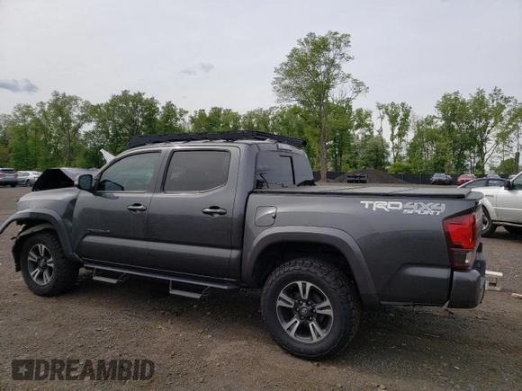 2019 Toyota Tacoma SR z VIN 3TMCZ5AN6KM283109, wystawiony jako Copart lot #58668905 z przebiegiem 44 923 mil mil oraz Szkoda całkowita • Salvage title. Historia ofert i sprzedaży dostępna na DreamBid. Obrazek 2.