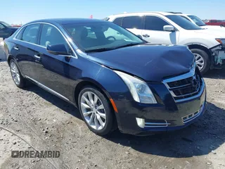 2016 Cadillac XTS Luxury Collection z VIN 2G61M5S35G9197733, wystawiony jako IAAI lot #41876783 z przebiegiem 108 151 mil mil oraz . Historia ofert i sprzedaży dostępna na DreamBid. Obrazek 1.