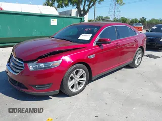 2014 Ford Taurus SEL with VIN 1FAHP2E86EG186642, listed as a IAAI auction lot 41901768 with 106,057 mi miles. Bid and sale history available at carsss.com. Image 17.