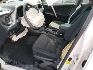 2017 Toyota RAV4 LE with VIN JTMBFREV1HD214337, listed as a Copart auction lot 52932765 with 23,959 mi miles and Salvage Title. Bid and sale history available at DreamBid. Image 7.