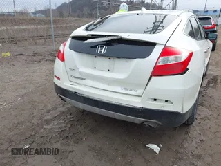 2013 Honda Crosstour EX-L z VIN 5J6TF2H52DL005559, wystawiony jako IAAI lot #41757271 z przebiegiem 171 850 mil mil oraz . Historia ofert i sprzedaży dostępna na DreamBid. Obrazek 6.
