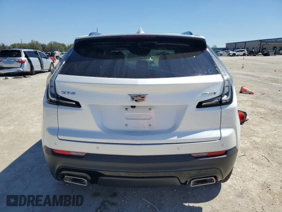2021 Cadillac XT4 FWD Sport with VIN 1GYFZER42MF076951, listed as a Copart auction lot 46797935 with 35,886 mi miles and Salvage Title. Bid and sale history available at DreamBid. Image 6.
