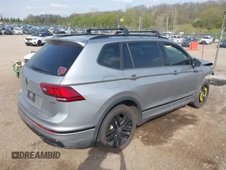 2022 Volkswagen Tiguan SE R-Line Black with VIN 3VV8B7AX7NM030703, listed as a IAAI auction lot 42135974 with 57,116 mi miles and . Bid and sale history available at DreamBid. Image 4.