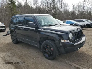 2015 Jeep Patriot High Altitude with VIN 1C4NJRAB0FD392874, listed as a Copart auction lot 52767375 with 134,522 mi miles and Salvage Title. Bid and sale history available at DreamBid. Image 4.
