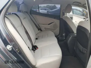 2015 Kia Optima LX z VIN KNAGM4A70F5554315, wystawiony jako Copart lot #57434125 z przebiegiem 109 200 mil mil oraz Czysty tytuł • Clean title. Historia ofert i sprzedaży dostępna na DreamBid. Obrazek 10.