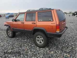1999 Jeep Cherokee Sport with VIN 1J4FF68S7XL560943, listed as a Copart auction lot 58425505 with 68,654 mi miles and Salvage title. Bid and sale history available at DreamBid. Image 2.