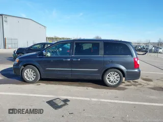 2014 Chrysler Town & Country Limited with VIN 2C4RC1GGXER176316, listed as a IAAI auction lot 41423119 with 150,109 mi miles and . Bid and sale history available at DreamBid. Image 14.