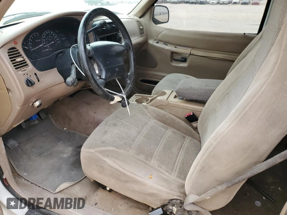 1999 Ford Explorer с VIN 1FMYU22E3XUA62129, выставлен на аукционе Copart как лот 87883565 с пробегом 250 605 миль миль и Списание • Salvage title. История ставок и продаж доступна на DreamBid. Изображение 7.