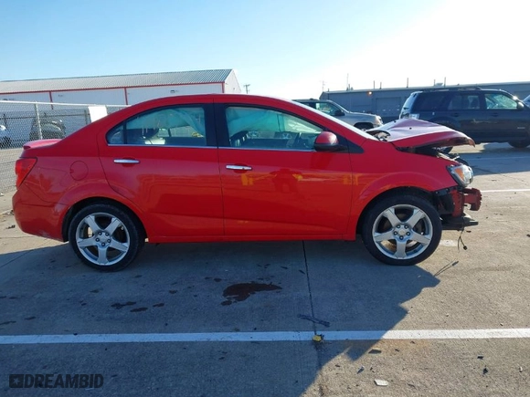 2015 Chevrolet Sonic LTZ with VIN 1G1JE5SB7F4145824, listed as a IAAI auction lot 41480734 with NaN miles. Bid and sale history available at carsss.com. Image 14.