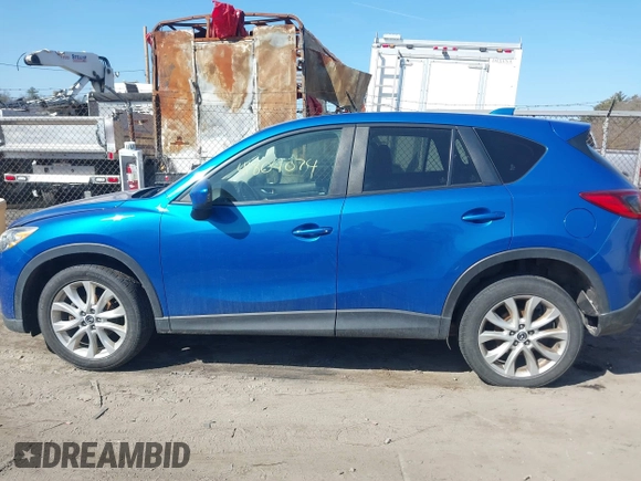 2013 Mazda CX-5 Grand Touring with VIN JM3KE4DE8D0151348, listed as a IAAI auction lot 41804074 with 145,120 mi miles. Bid and sale history available at carsss.com. Image 14.