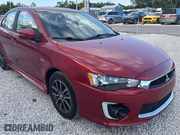 2016 Mitsubishi Lancer SE with VIN JA32V2FW5GU013006, listed as a Copart auction lot 55860815 with 122,815 mi miles and Clean Title. Bid and sale history available at carsss.com. Image 1.