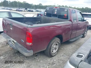 1999 Ford F-150 with VIN 1FTRX17W2XNB98256, listed as a IAAI auction lot 41931497 with Not Provided miles and . Bid and sale history available at DreamBid. Image 4.