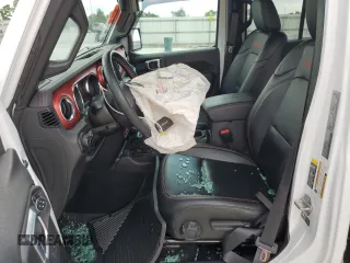 2021 Jeep Gladiator Rubicon z VIN 1C6JJTBG0ML624275, wystawiony jako Copart lot #62840275 z przebiegiem Nie podano mil oraz Szkoda całkowita • Salvage title. Historia ofert i sprzedaży dostępna na DreamBid. Obrazek 7.