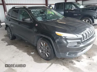 2014 Jeep Cherokee Limited z VIN 1C4PJMDS4EW182532, wystawiony jako IAAI lot #42368726 z przebiegiem 124 060 mil mil oraz . Historia ofert i sprzedaży dostępna na DreamBid. Obrazek 1.