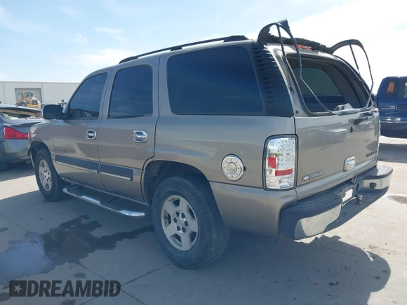 2003 Chevrolet Tahoe LS with VIN 1GNEC13V23R141539, listed as a IAAI auction lot 41812195 with 486,815 mi miles. Bid and sale history available at carsss.com. Image 3.