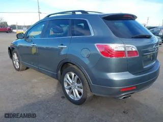 2011 Mazda CX-9 Grand Touring with VIN JM3TB3DV9B0310575, listed as a IAAI auction lot 41313813 with 146,915 mi miles. Bid and sale history available at carsss.com. Image 3.