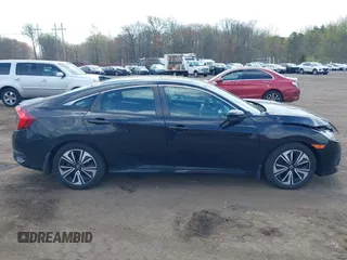 2017 Honda Civic EX-L z VIN 2HGFC1F72HH647147, wystawiony jako IAAI lot #42064784 z przebiegiem 139 893 mil mil oraz . Historia ofert i sprzedaży dostępna na DreamBid. Obrazek 13.