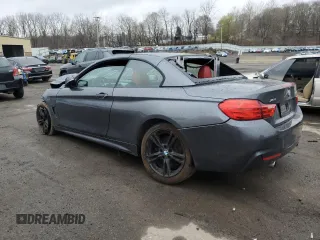 2015 BMW 4 Series 435i xDrive with VIN WBA3T7C56FP942328, listed as a Copart auction lot 52410695 with Not provided miles and Salvage title. Bid and sale history available at DreamBid. Image 2.
