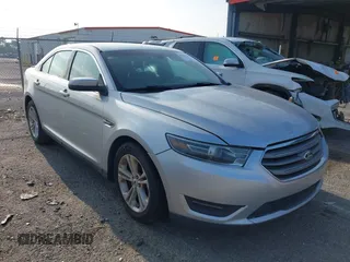 2015 Ford Taurus SEL z VIN 1FAHP2E85FG174242, wystawiony jako IAAI lot #42407291 z przebiegiem 108 852 mil mil oraz . Historia ofert i sprzedaży dostępna na DreamBid. Obrazek 1.