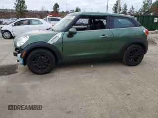 2015 MINI Paceman z VIN WMWSS1C56FWN95231, wystawiony jako Copart lot #84958124 z przebiegiem 65 099 mil mil oraz Szkoda całkowita • Salvage title. Historia ofert i sprzedaży dostępna na DreamBid. Obrazek 1.