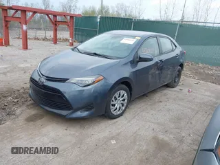 2019 Toyota Corolla L with VIN 5YFBURHE6KP934951, listed as a IAAI auction lot 42000940 with 92,794 mi miles and . Bid and sale history available at carsss.com. Image 2.