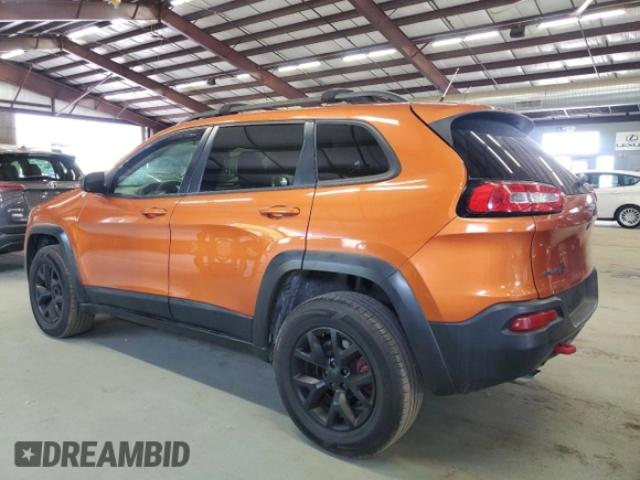 2015 Jeep Cherokee Trailhawk z VIN 1C4PJMBS8FW727992, wystawiony jako Copart lot #59799425 z przebiegiem 127 853 mil mil oraz Czysty tytuł • Clean title. Historia ofert i sprzedaży dostępna na DreamBid. Obrazek 2.
