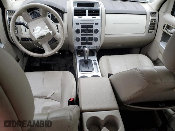 2010 Mercury Mariner Premier with VIN 4M2CN9HGXAKJ19825, listed as a Copart auction lot 44738925 with 147,657 mi miles and Salvage title. Bid and sale history available at DreamBid. Image 8.