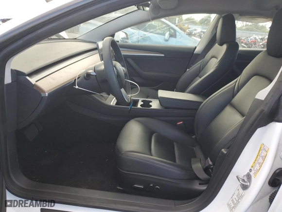 2023 Tesla Model 3 with VIN 5YJ3E1EA7PF579683, listed as a Copart auction lot 87651765 with 9,048 mi miles and Salvage Title. Bid and sale history available at carsss.com. Image 7.